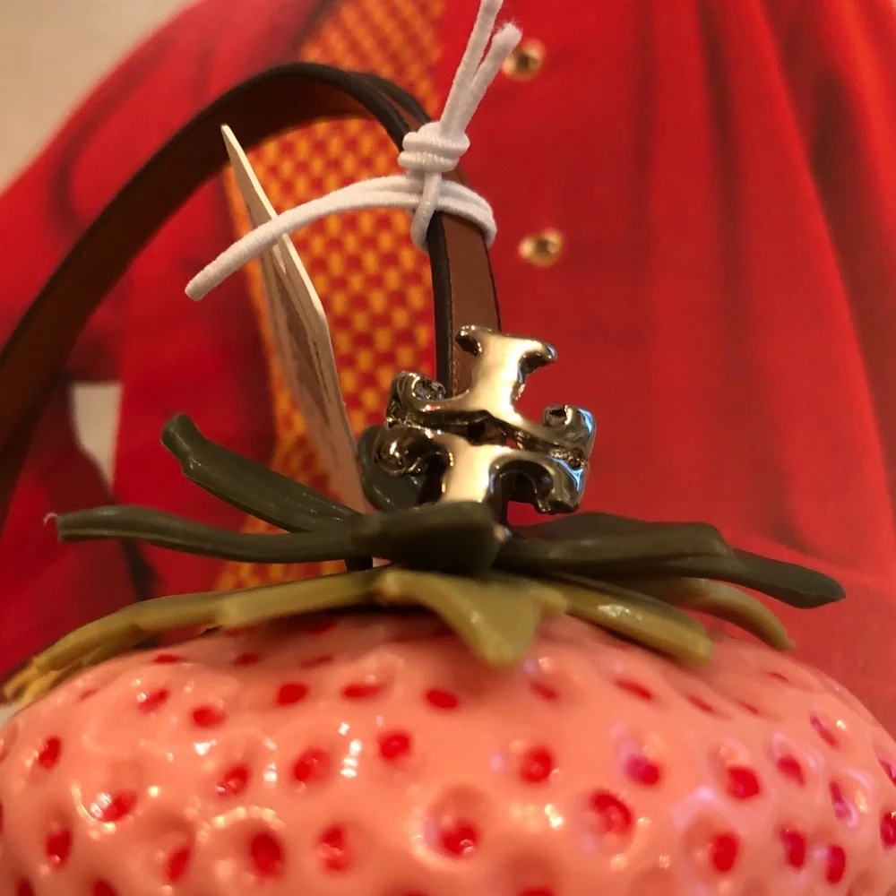 Authentic New with tag. Tory Burch Pink Strawberry bag charm.